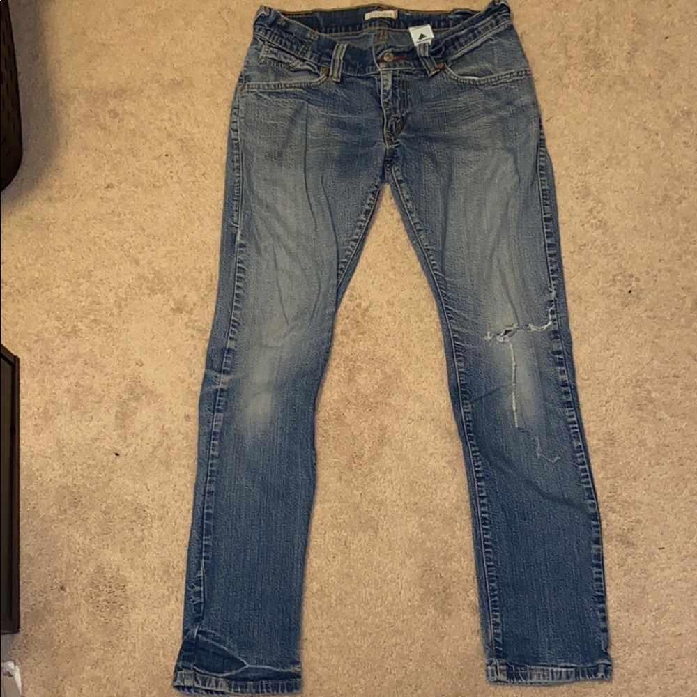 Levi 504 distressed jeans